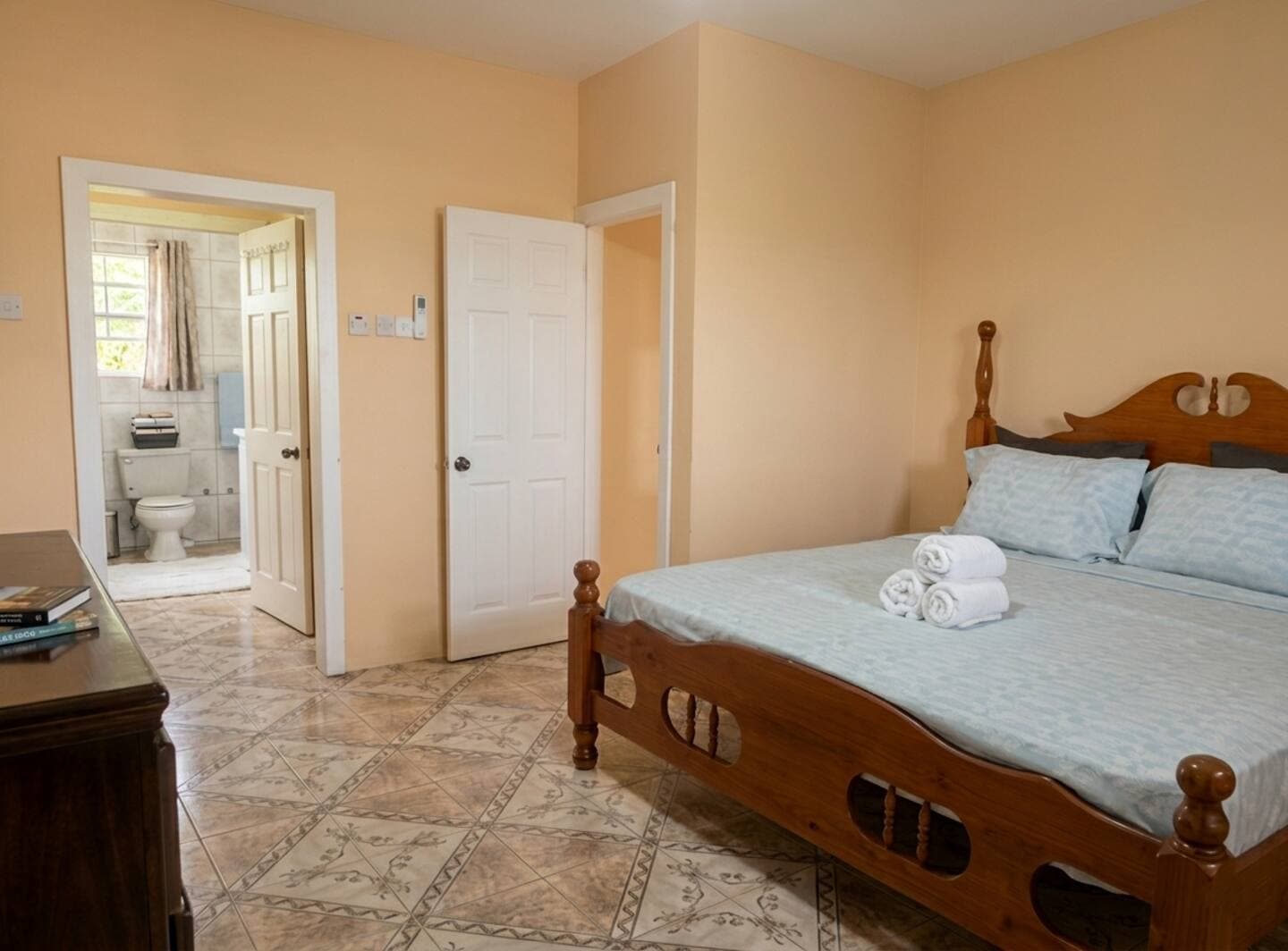 Bright bedroom of a 3-bedroom ocean-breeze retreat in Calibishie, Dominica